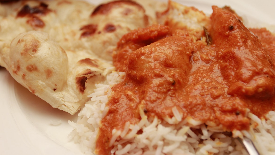 Curry served with basmati rice and naan